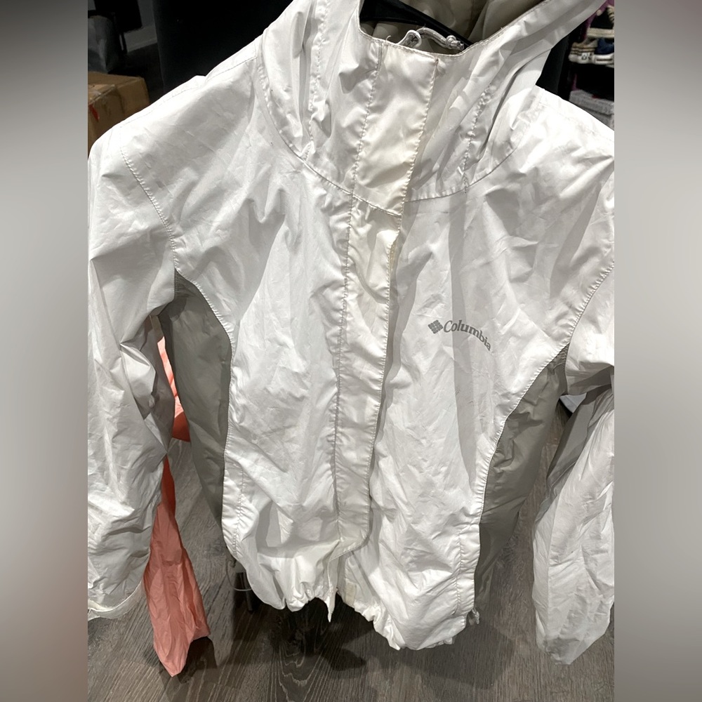 White and grey Columbia windbreaker